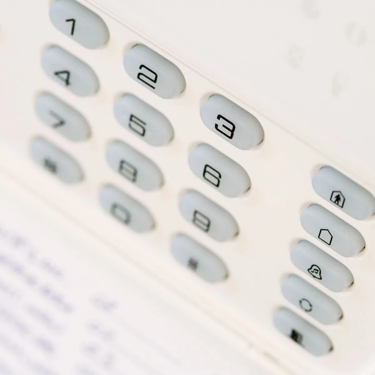 Commercial alarm system panel in an Ontario business without professional monitoring